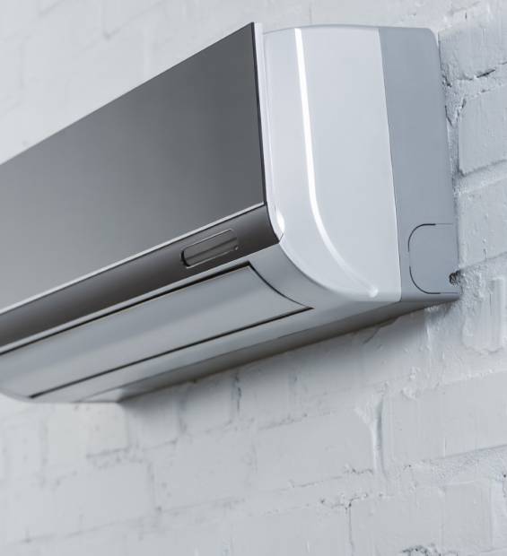 close-up-shot-of-grey-air-conditioner-hanging-on-w-2023-11-27-05-15-06-utc close-up-shot-of-grey-air-conditioner-hanging-on-w-2023-11-27-05-15-06-utc